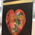 Cuadro de corazón con lingotes de oro