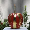 Manzana Recubierta en toques rojos y dorados