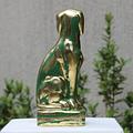 Estatuilla Verde de Perro recubierta en oro laminado